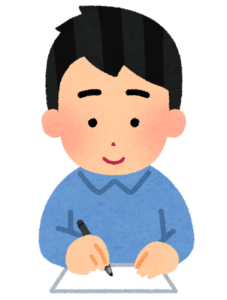 書きものをする男性